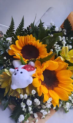 Buquê de girassóis com pelúcia